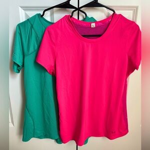 UNDER-ARMOR & THE NORTH FACE- set of two women’s short sleeve workout shirts.